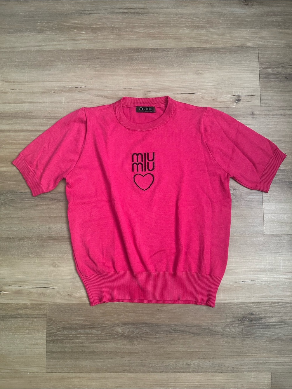 Vintage Miu Miu pink knit top featuring iconic MIU MIU heart graphic
